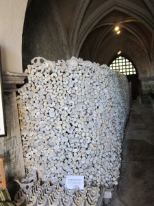 Stacked bones in the Charnel House, St Leonard's Church, Hythe.